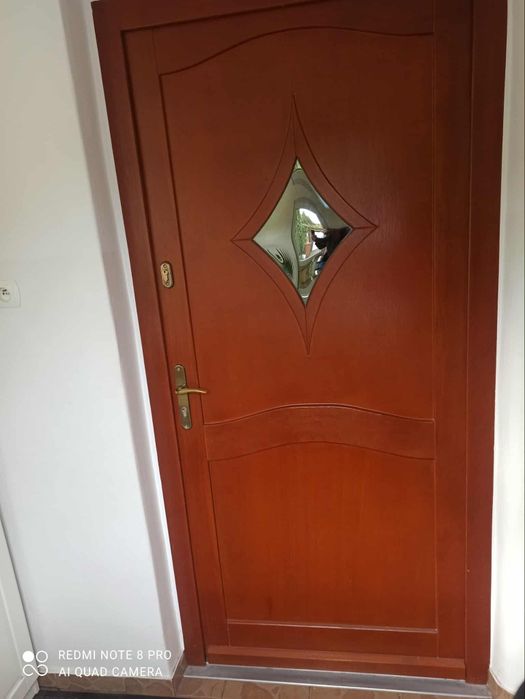 Drzwi drewniane zewnętrzne lub wewnątrzklatkowe ,