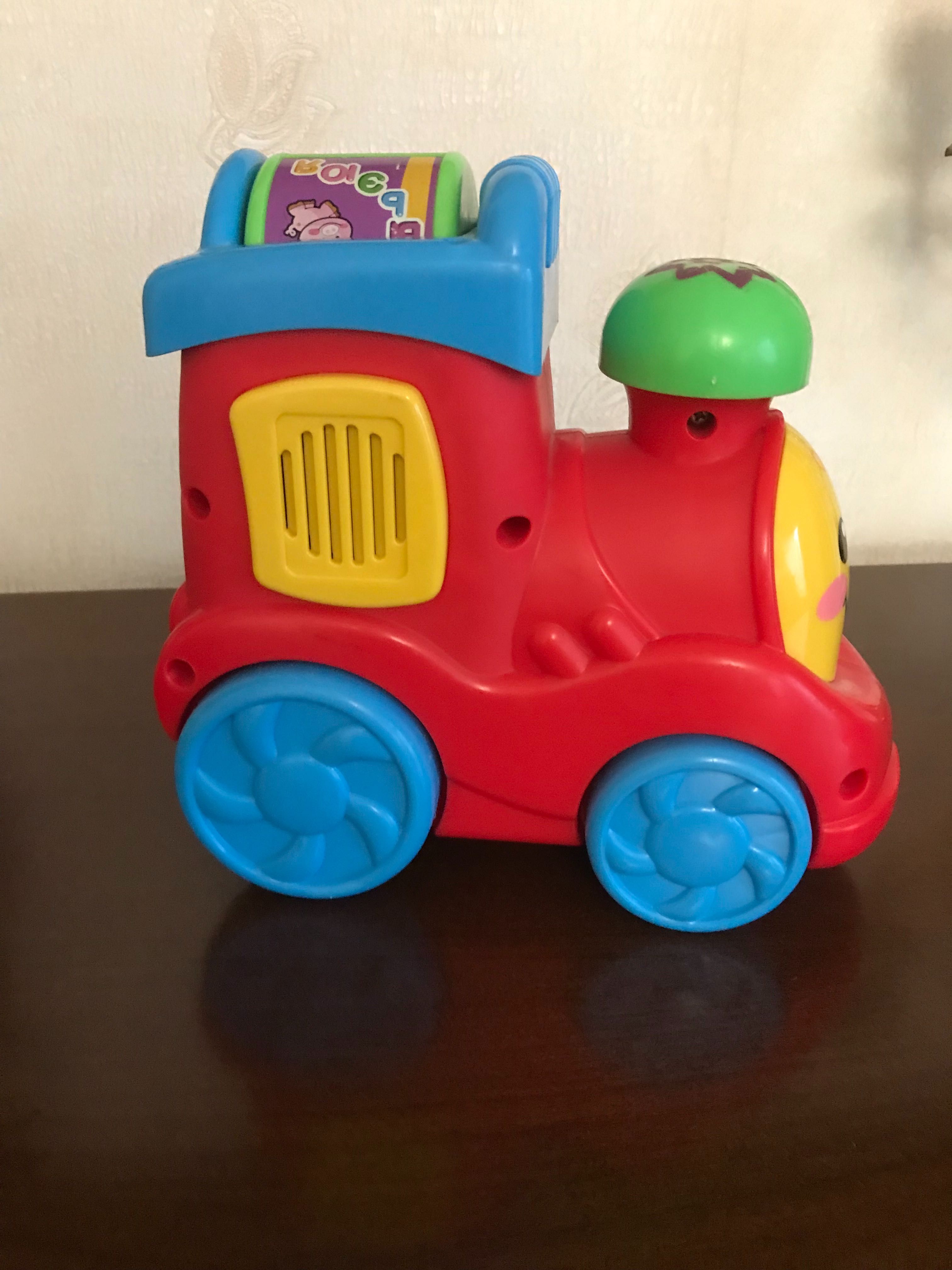 Музыкальный паровозик Fisher Price