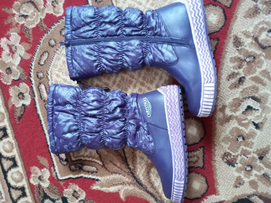 Продам зимові чобітки