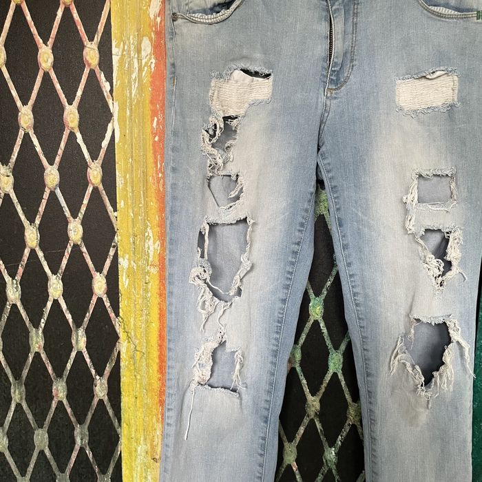 Spodnie jeansowe z dziurami Pieszak [27]