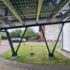 Carport fotowolticzny szczelny dach z paneli dwustanowiskowy aluminium