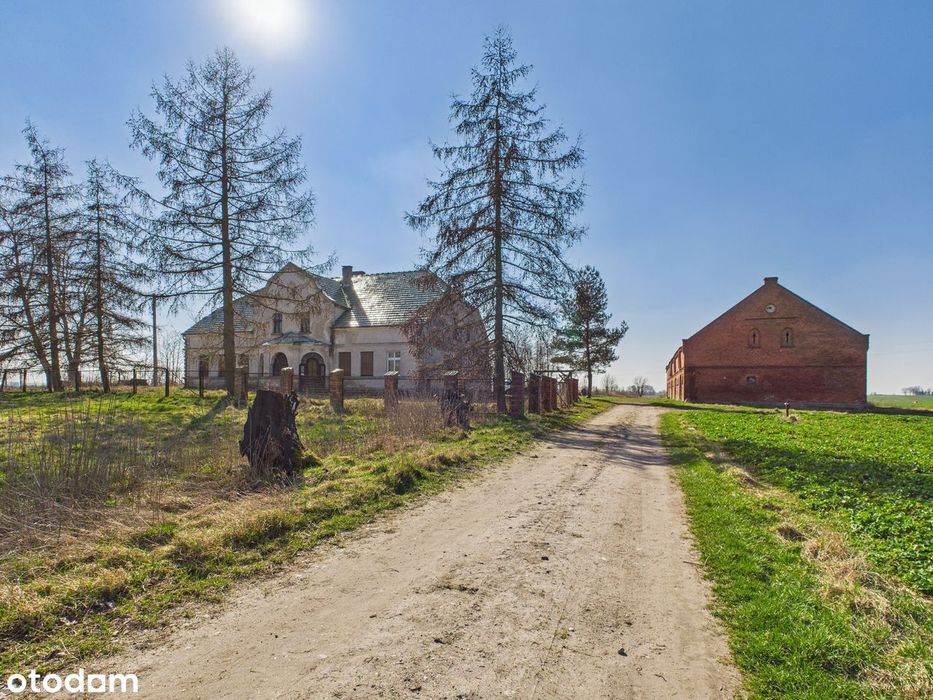 Gospodarstwo rolne-dom, budynek gospodarczy, staw i 14ha ziemi