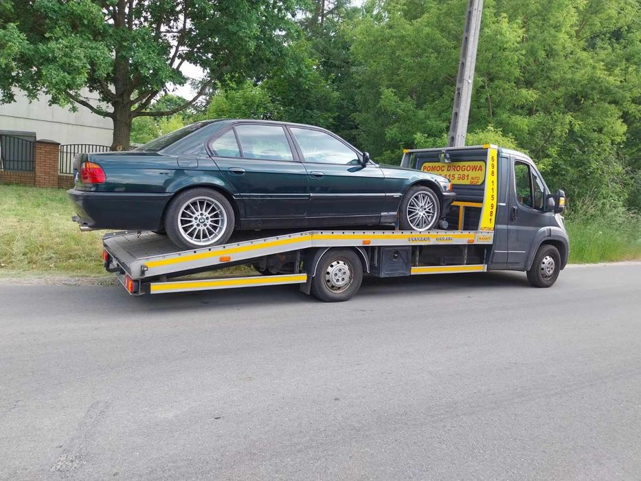 Holowanie Transport Autolaweta  Pomoc drogowa A1