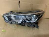 Lampa przednia lewa LED Nissan Micra K14 oryg 100-18728