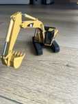 NZG Modelle 367 Caterpillar koparka zabawka retro