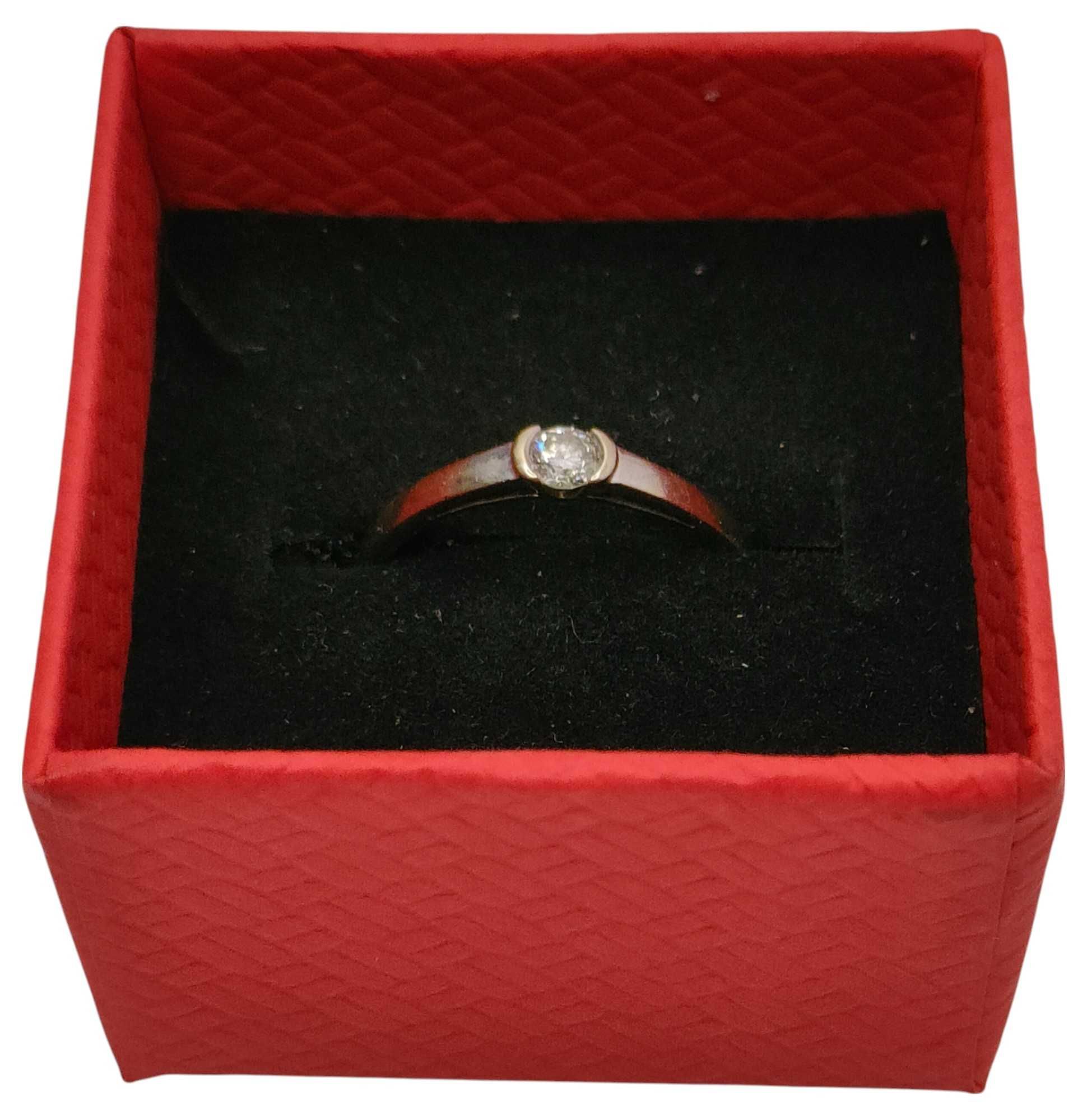 Pierścionek z białego złota 585/1,11G/R11 brylant 0,13CT Apart certyf.