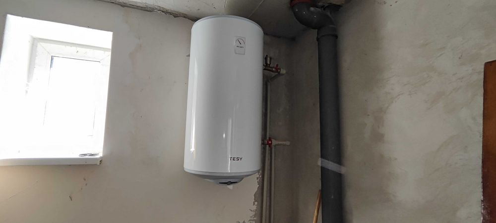 Продам нову половину будинку.Три роздільні кімнати.Два санвузли.Гараж