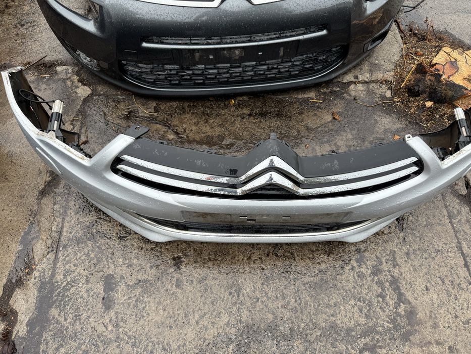 Бампер перід Сітроен С4 Citroen C4B7 ексклюзив з омивачами фар 2016