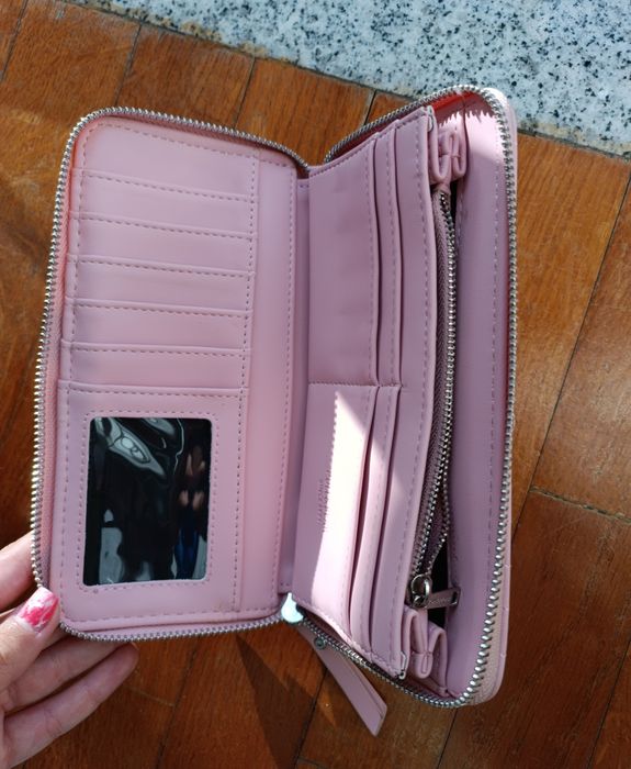 Carteiras como novas