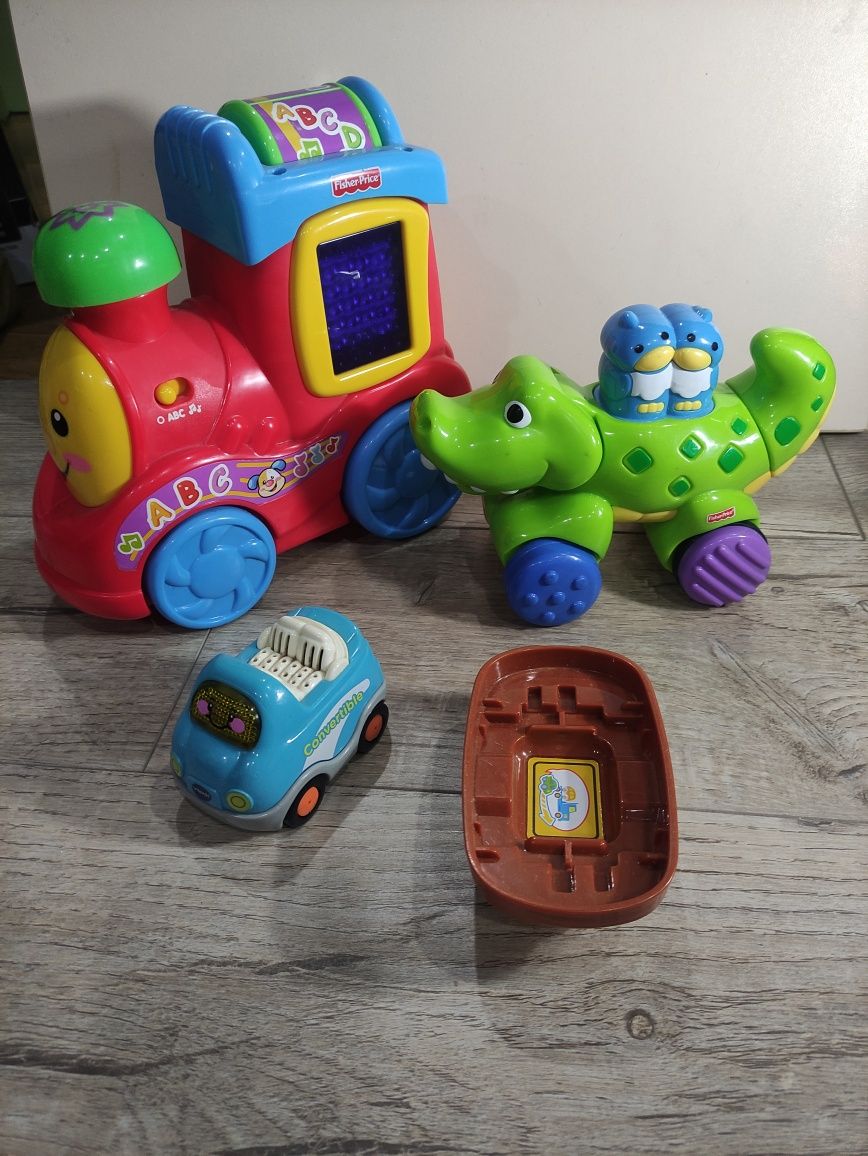 Музыкальный развивающий центр , будинок, ковчег, потяг Fisher Price