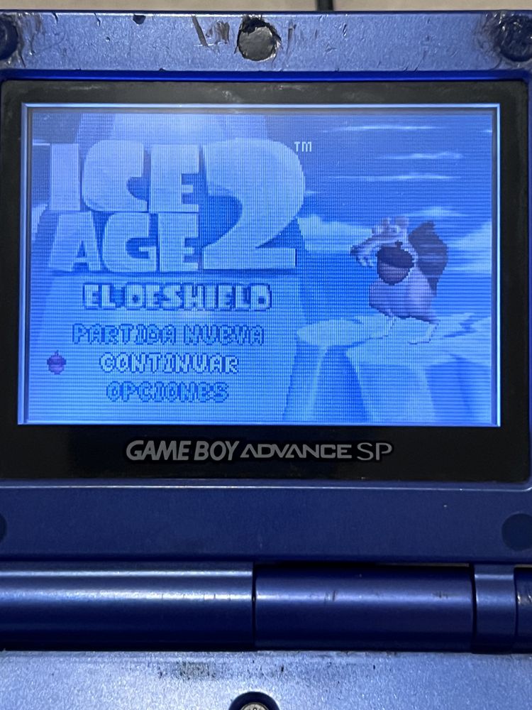 Gameboy advance sp azul com carregador e 4 jogos