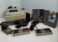 Nintendo NES com 2 comandos e 3  jogos