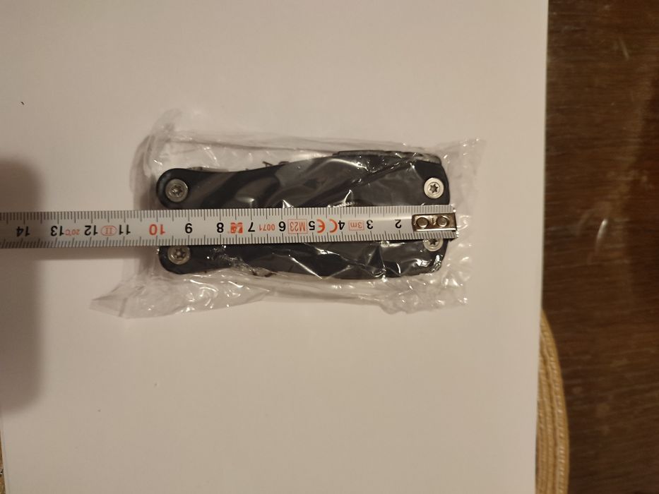 Новий мультітул, 9 в 1 , пласкогубці, кусачки, ніж , відкривачка...