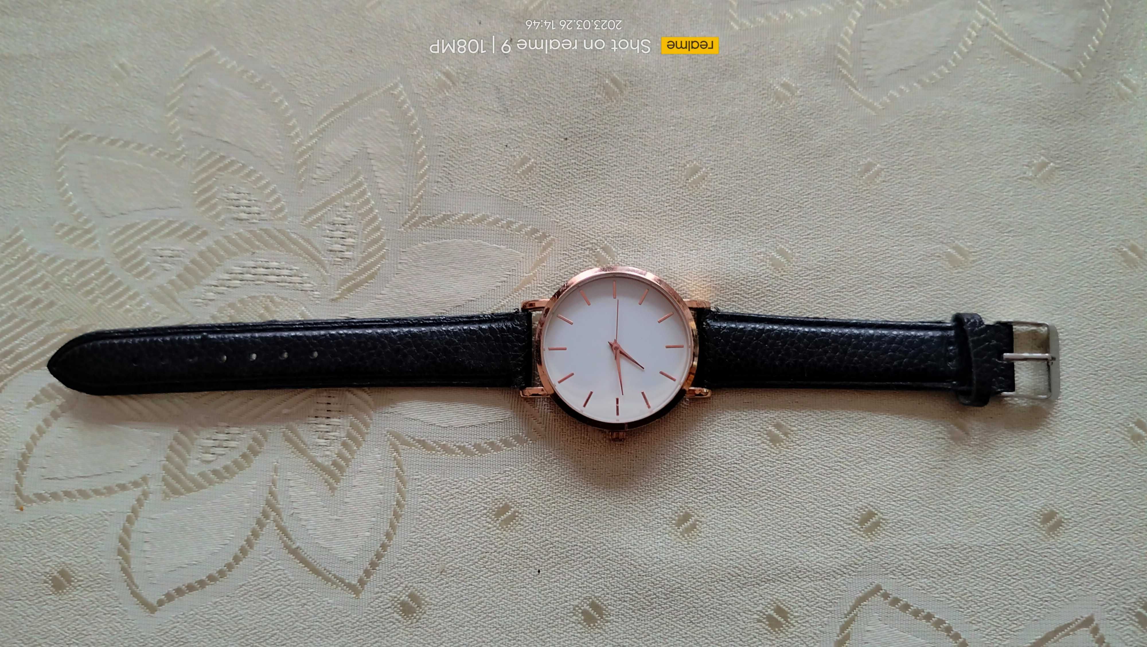 Elegancki zegarek z czarnym nowym paskiem skórzanym