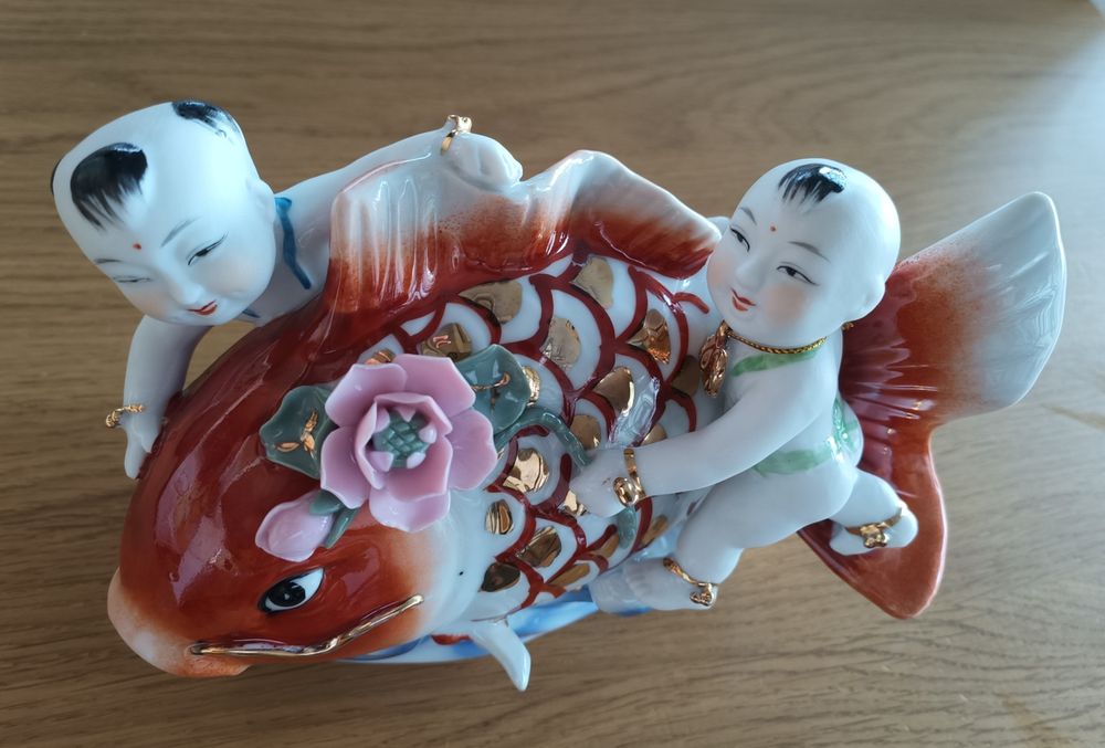 Estatueta em porcelana