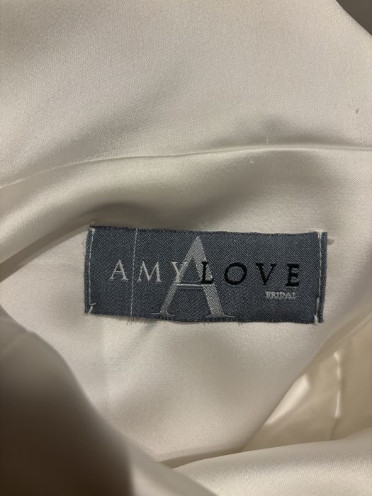 Suknia ślubna, gładka, na ramiączkach. Katowice/Mielec