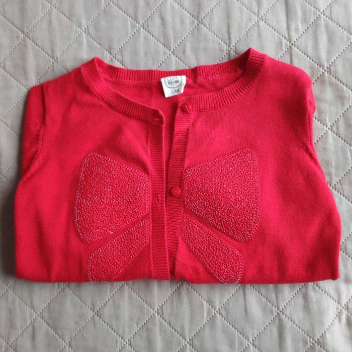 Czerwony sweterek 134