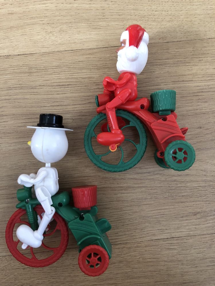 Санта/сніговик на велосипеді іграшка заводна