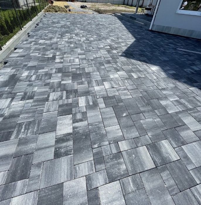 Вкладання бруківки,тротуарної плитки.