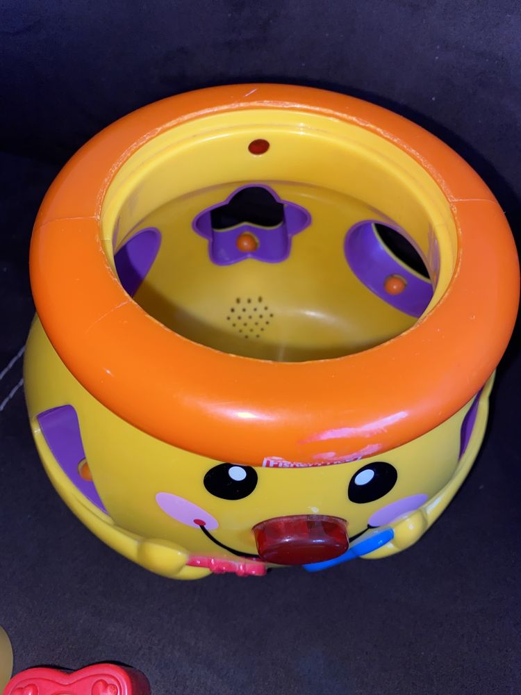 Garnuszek na klocuszek Fisher Price