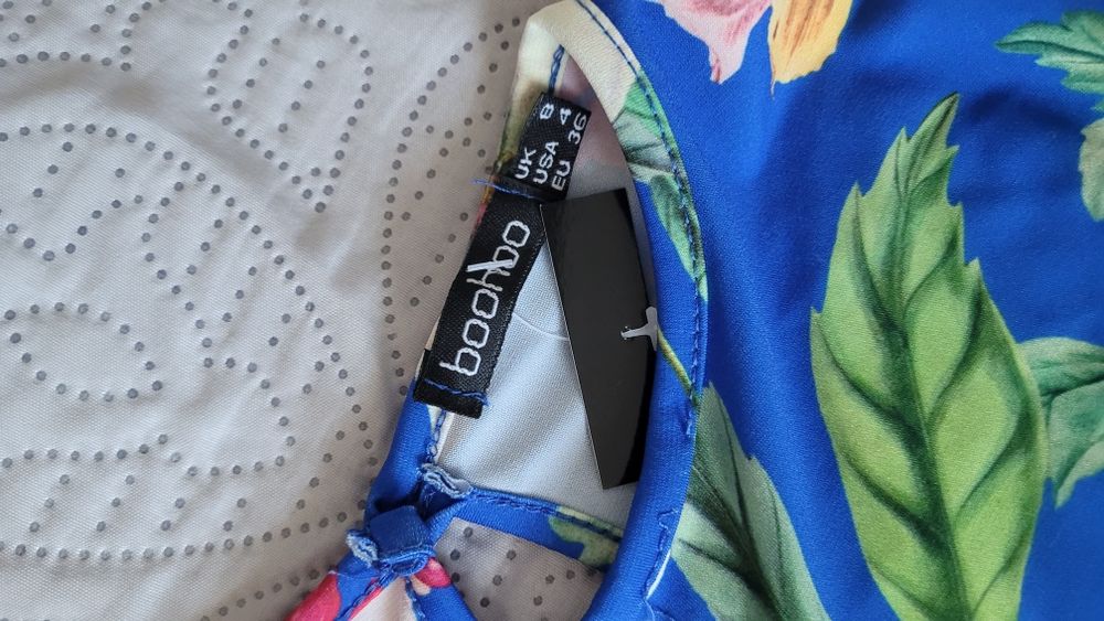 Nowy prześliczny krótki kombinezon damski letni kwiatowy motyw