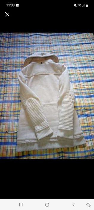 Casaco    S/M   bom estado