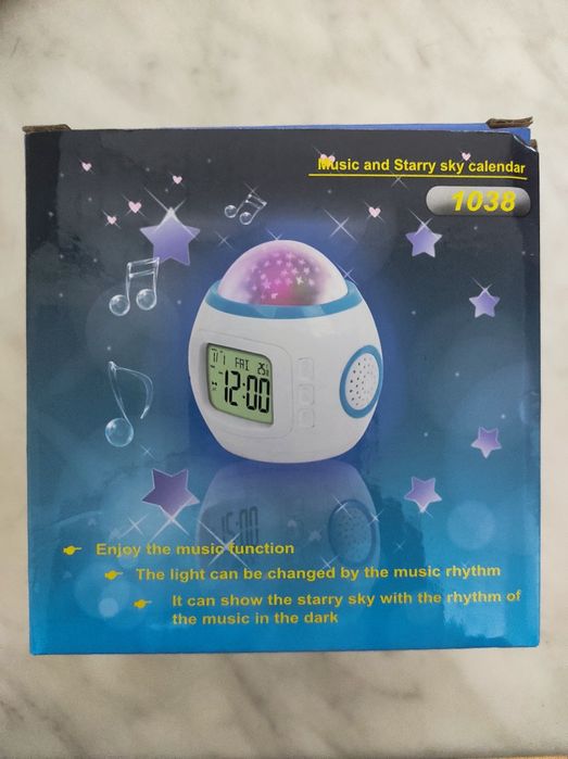 Новий музичний нічник - годинник
