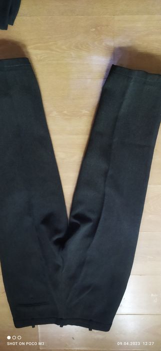 Костюм и брюки б/у.