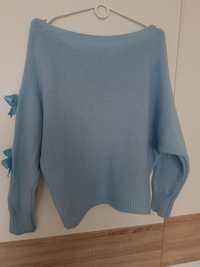 Sweter w  kokardki