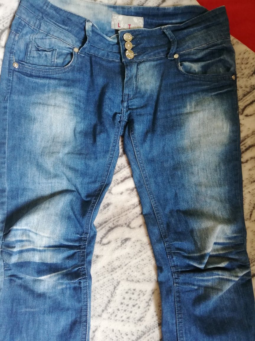 Spodnie spodnie jeans roz. L/31