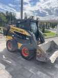 Мінінавантажувач New Holland L180.