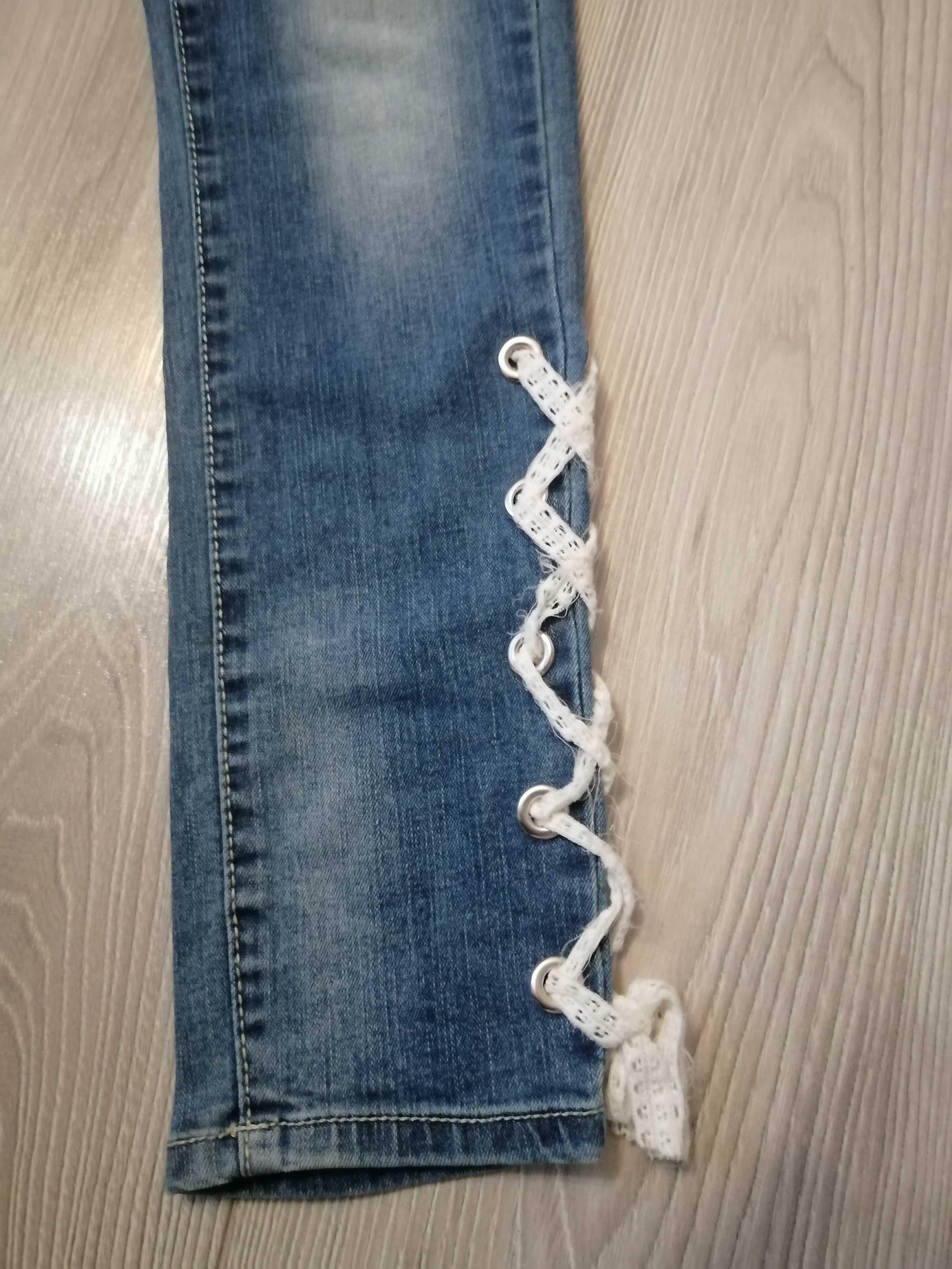 spodnie jeansowe firmy Happy House dla dziewczynki w rozmiarze 134/140