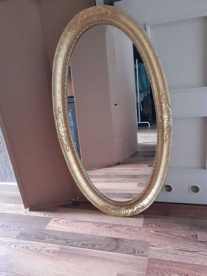 Duże lustro w złotej ramie 120x70 glamour okrągłe owalne