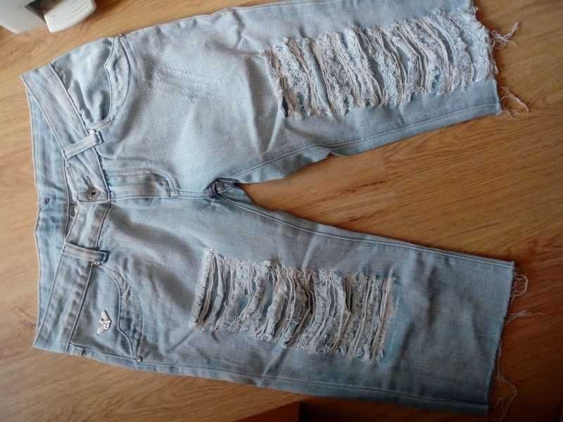 Jeansowe spodnie rybaczki do łydki