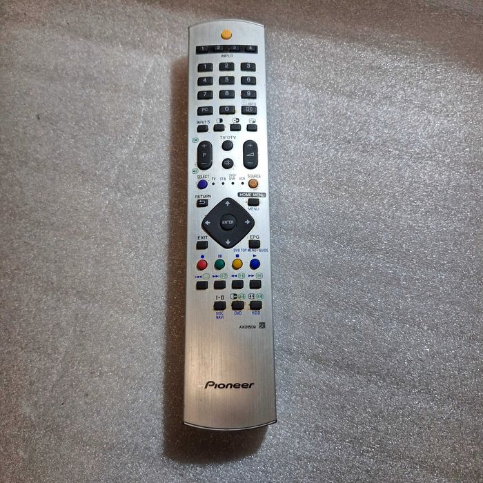 Oryginalny pilot Pioneer AXD7699 do amplitunera srebrny sprawny