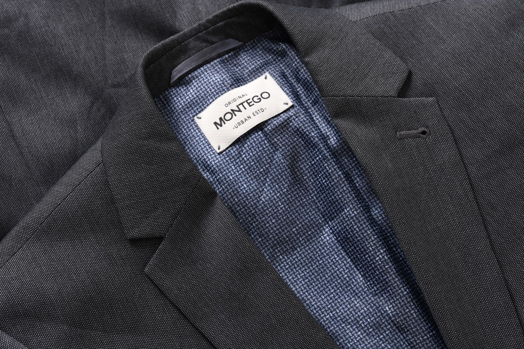 MONTEGO elegancki ciemnoszary garnitur męski w jodełkę slim fit r. 50