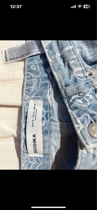 calça jeans com desenhos