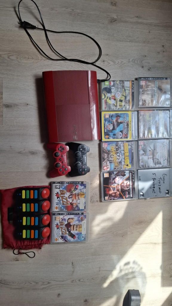PlayStation 3 Super Slim Czerwona Edycja + 2 Pady + Gry + Buzz Quiz