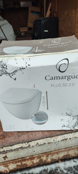 Унітаз підвісний без обітковий Германия  прихований мантаж плюс кришка