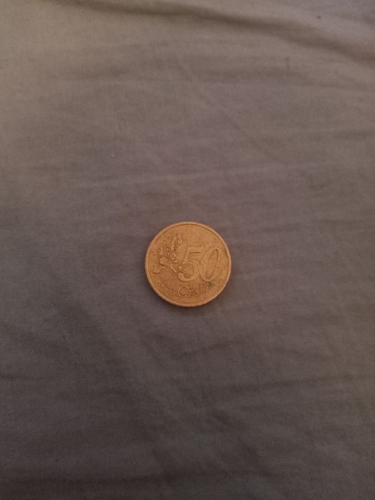 Продам монету 50центів