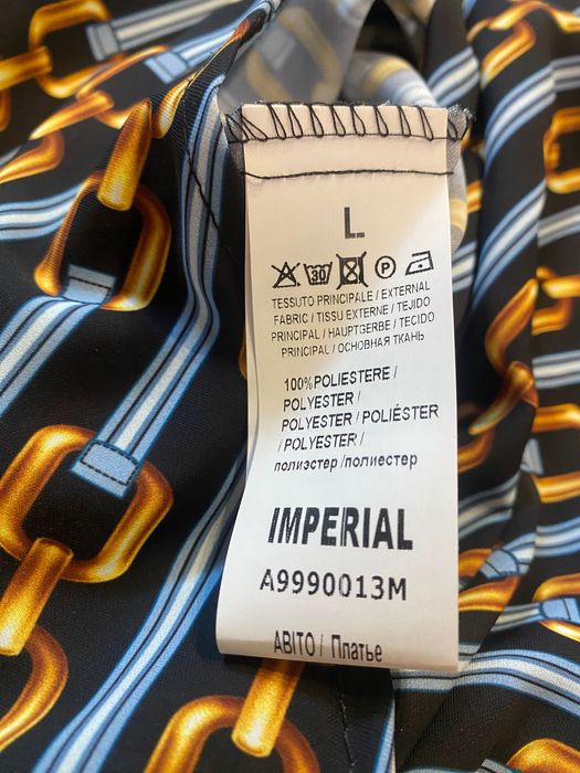 Sukienka Imperial stójka bufiasty długi rękaw glamour awangardowa