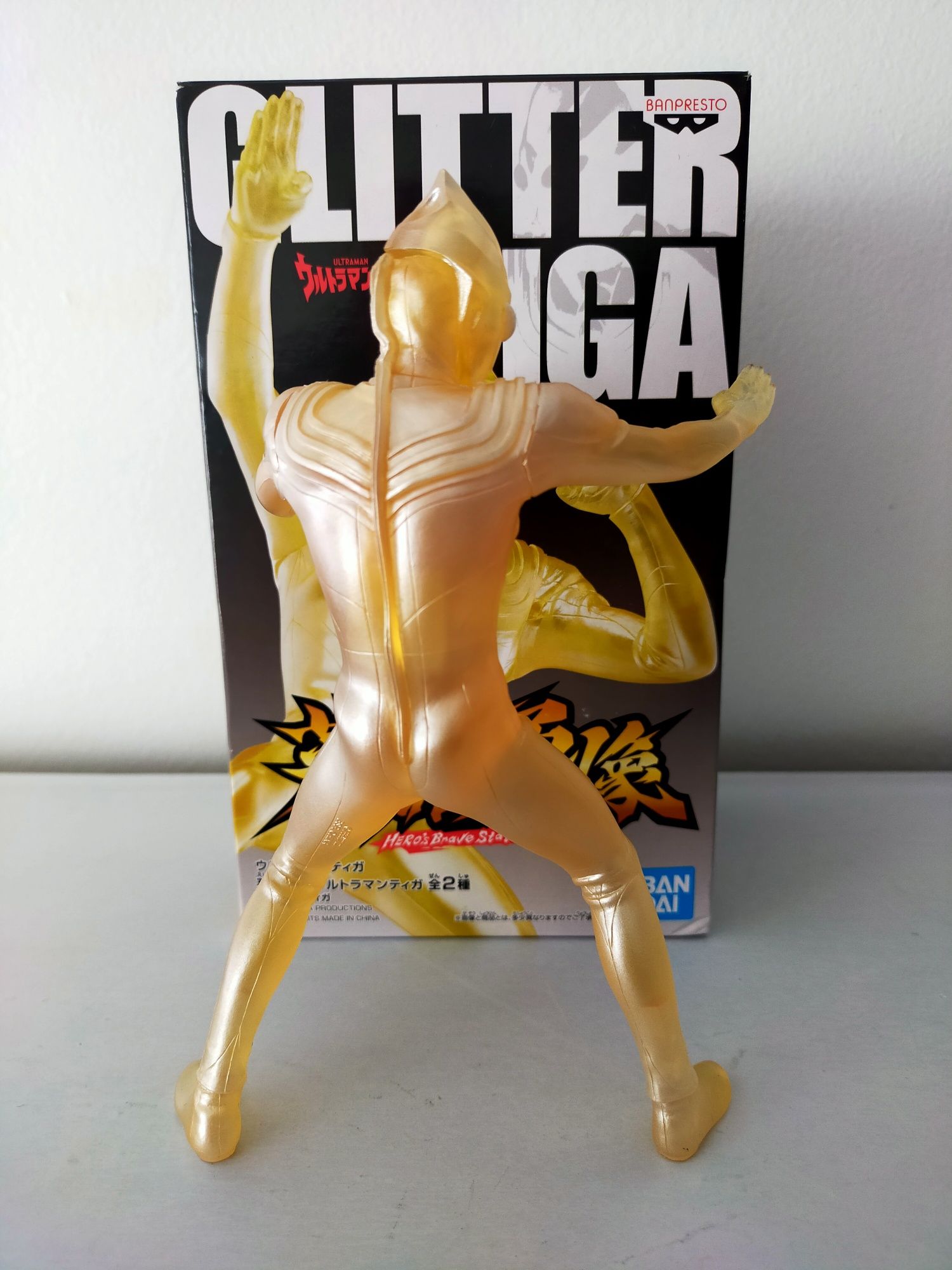 Figura Glitter Tiga Gold Nova Embalada