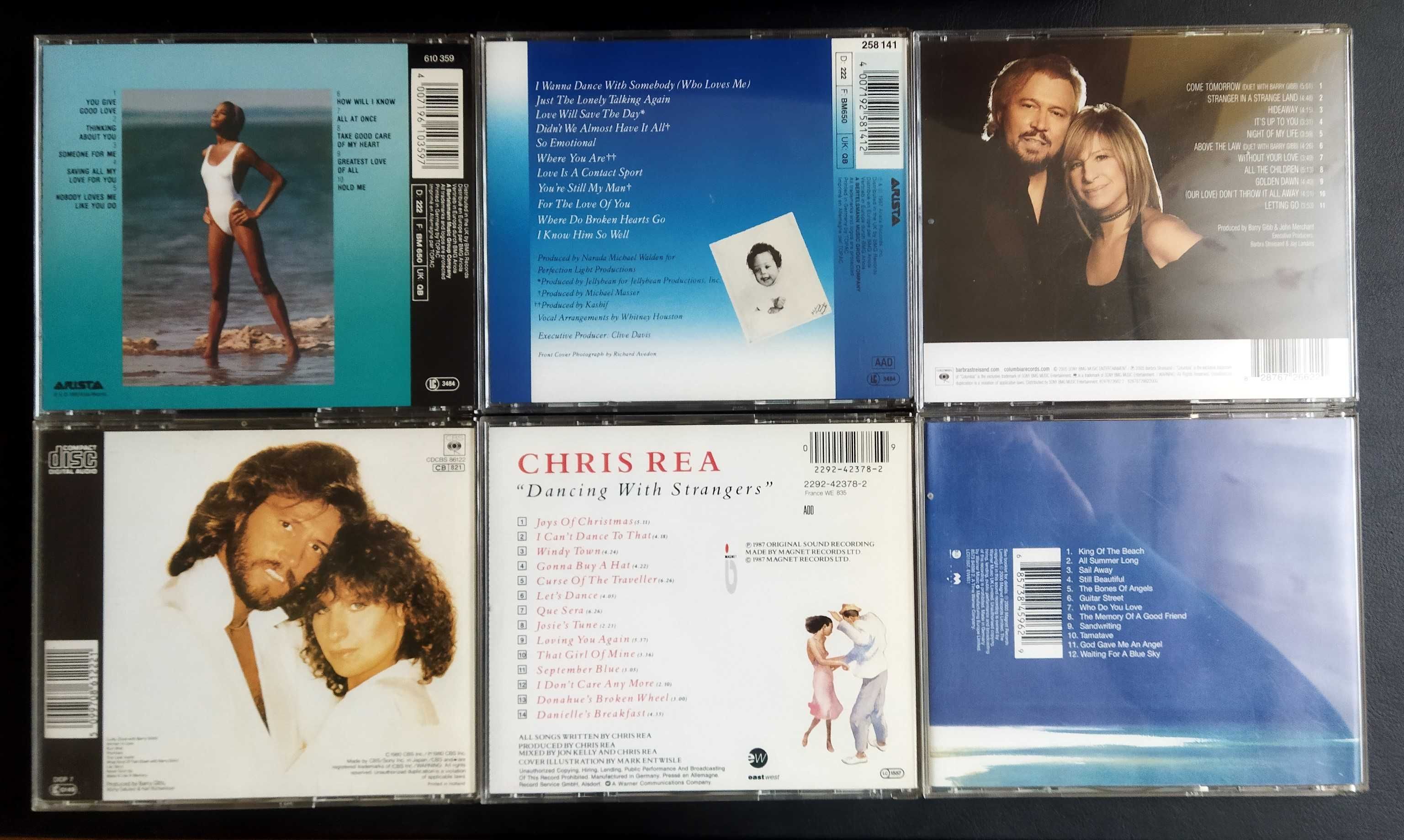 Płyty CD - Whitney Houston i Barbry Streisand.