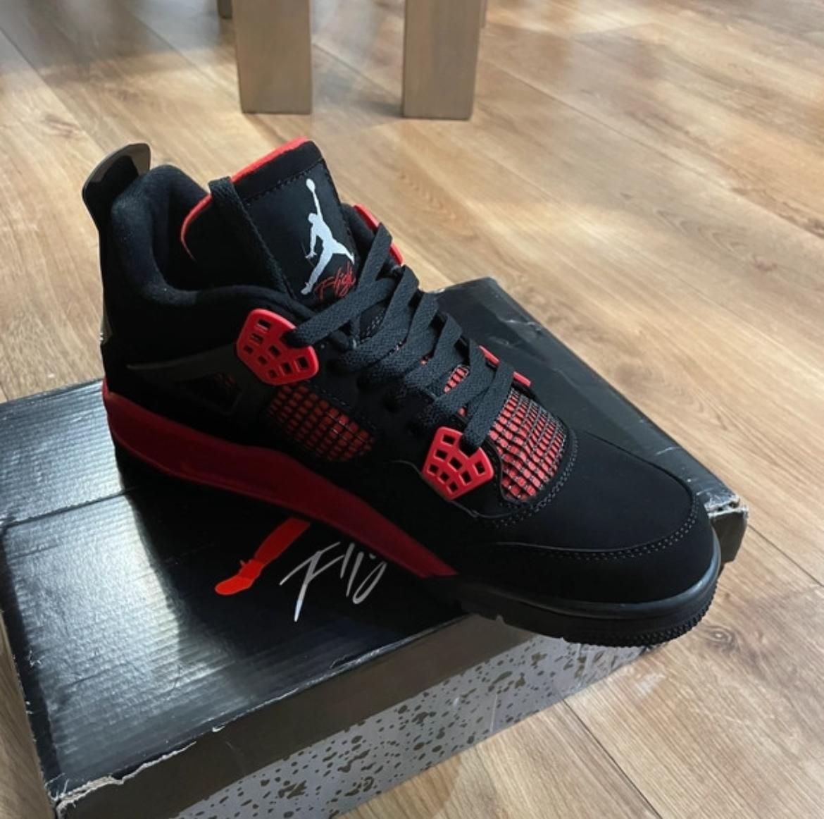 Jordany 4 czerwono czarne sneakersy męskie modne oryginalne 45,5