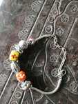 pulseira em metal , com alguns anos