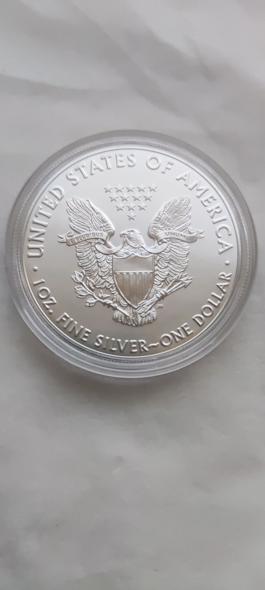Срібний орел, срібний долар, шагающая статуя, інвестиційна срібна моне