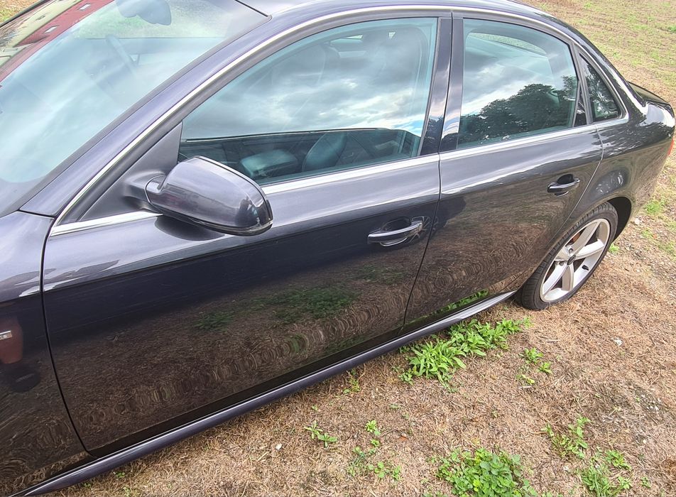 2szt LISTWY SLINE progowe LEWA +PRAWA Audi A4 B8 2009r LZ7L