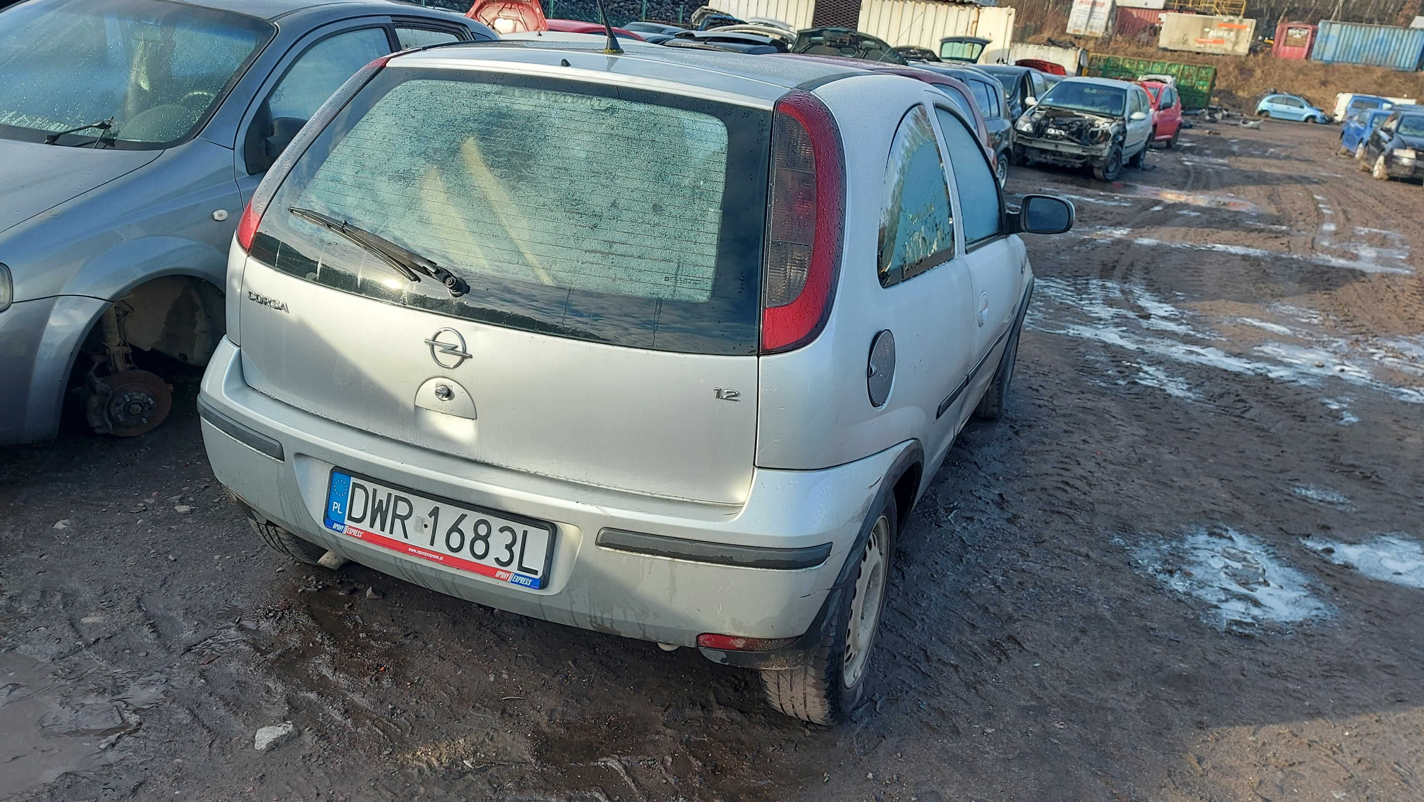 Opel Corsa C maska przednia srebrna Z157 FV części/dostawa