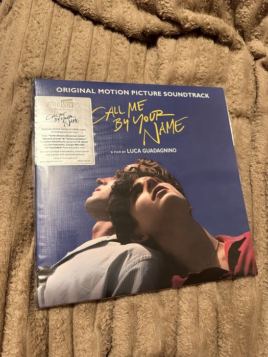 Платівка та книги Call Me by Your Name