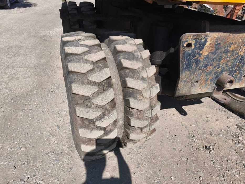 Колісний екскаватор повноповоротний екскаватор JCB JS145 2002року